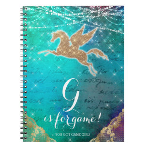 Unicorn-Glitzer-Gold beleuchtet blauen Buchstaben Notizblock