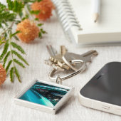 Unter dem Deckmantel Schlüsselanhänger (Seite)