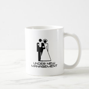 Unter dem neuen Management verheiratet Kaffeetasse
