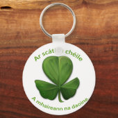 Unter dem Schutz der anderen überleben Menschen Schlüsselanhänger (Vorderseite)