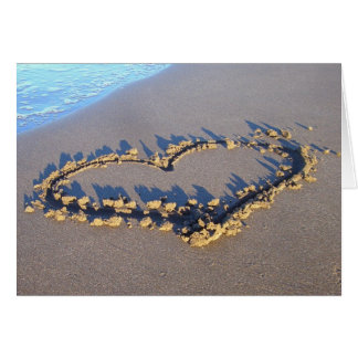 unter meinem Regenschirm/Herzen im Sand