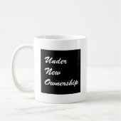 Unter neuem Eigentum Kaffeetasse (Links)