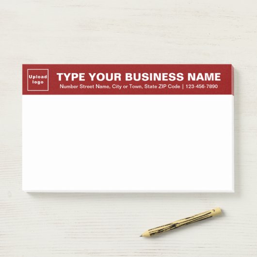 Unternehmensmarke auf der roten Führungsebene der Post-it Klebezettel (Auf Schreibtisch)