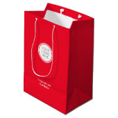 Unternehmenstasche mit Logos und Firmendetails Mittlere Geschenktüte (Rückseite Schrägansicht)