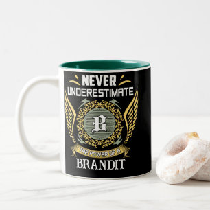Unterschätze niemals die Macht einer Marke Zweifarbige Tasse