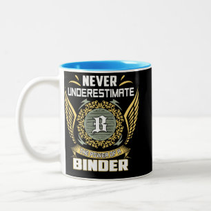 Unterschätze niemals die Macht eines Binders Zweifarbige Tasse