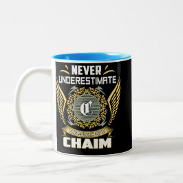 Unterschätze niemals die Macht eines Chaim Zweifarbige Tasse