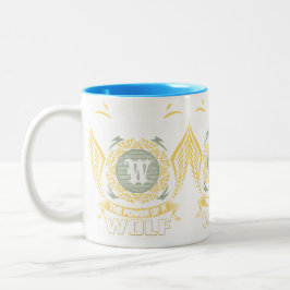 Unterschätze niemals die Macht eines Wolfes Zweifarbige Tasse