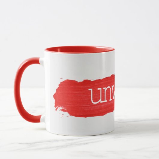 UNWIND-Text auf der roten Paint-Tasse Tasse (Links)