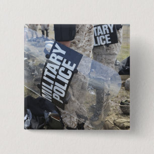 US-Marineinfanteristen und -Matrosen treiben Unruh Button