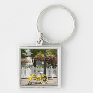 USA, Michigan, Mackinac Island. Gelbes Fahrrad Schlüsselanhänger