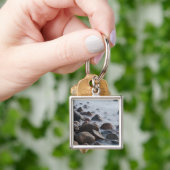 USA, New York, East Hampton. Surfen im Ozean Schlüsselanhänger (Hand)