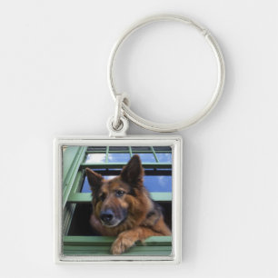 USA, Oregon, Portland. Griff nach dem Haar Schlüsselanhänger