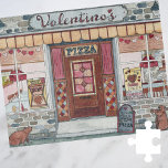 Valentine's Day Pizza Shop Wasserfarbe Puzzle<br><div class="desc">In diesem renommierten Pizzeria-Schaufenster des Valentinstag-Puzzles finden Sie originale Kunstwerke eines Pizzeria-Salons in der Altstadt, Valentino's, das die Spezialitäten des Valentinstag serviert. Zwei hungrige Paradiese stehen vorne, mit Schildern für die Urlaubsspezialitäten und einer Tafel, die lautet: "Alles, was man braucht, ist Liebe und Pizza". Dieses Puzzle wurde von den Geschäften...</div>