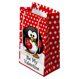 Valentinpinguin mit Schokolade und Rose Kleine Geschenktüte