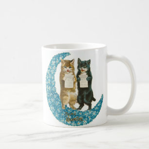 Valentinskätzchen auf einem blauen Blumenmond Kaffeetasse