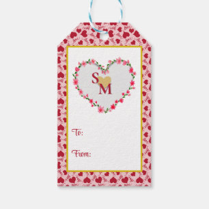 Valentinstag mit rotem Anfangsbuchstaben und golde Geschenkanhänger