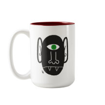 Vampirklops mit grüner Tasse