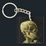 Van Gogh Smoking Skeleton Schlüsselanhänger<br><div class="desc">Schlüsselanhänger mit Vincent van Goghs Ölgemälde Skull of a Skeleton with Burning Cigarette (1885-86). Ein großartiges Geschenk für die Fans von Post-Impressionismus und holländischer Kunst!</div>