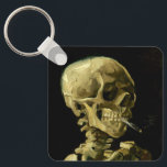 Van Gogh Smoking Skeleton Schlüsselanhänger<br><div class="desc">Schlüsselanhänger mit Vincent van Goghs Ölgemälde Skull of a Skeleton with Burning Cigarette (1885-86). Ein großartiges Geschenk für die Fans von Post-Impressionismus und holländischer Kunst!</div>