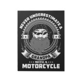 Vatergeschenk Power eines Opfers mit einem Motorra Notizblock (Rotiert)