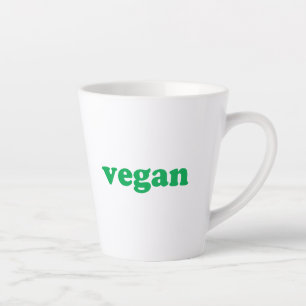 "vegane" grüne Buchstaben, weißer Hintergrund Milchtasse