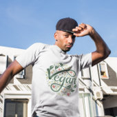 Vegane kreative Typografie mit grünen Blätter T-Shirt