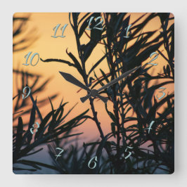 Vegetation bei Sonnenuntergang Quadratische Wanduhr