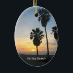 Venice Beach California Keramikornament<br><div class="desc">Dieses Foto zeigt große Palmen in der Silhouette,  stehend gegen einen herrlichen,  lebhaften,  gelben,  orangefarbenen und roten Sonnenuntergang über dem Pazifischen Ozean in Venice Beach,  Kalifornien. Fügen Sie optionalen Text oder Ihre Urlaubstermine für ein einzigartiges Souvenir hinzu. Ein weiteres exklusives Design von Sonja Quidama Image Code: sfvbs</div>