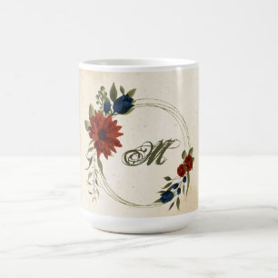 verbrannte orange- und marineblaue Blumen und Grün Kaffeetasse