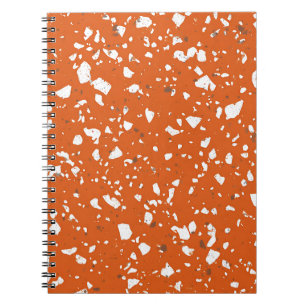 Verbranntes orangefarbenes Marmormerkheft Notizblock