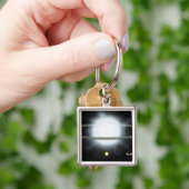 Vergleich der Größe eines übergroßen Sterns Schlüsselanhänger (Hand)