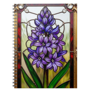 Verkleidetes Glasfenster mit lebhafter Blume Notizblock