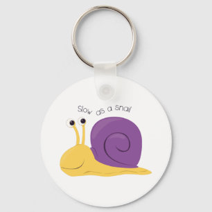 Verlangsamen Sie als Schnecke Schlüsselanhänger