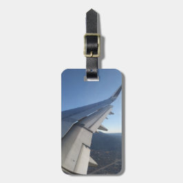 Verlassend auf einem Gepäckanhänger für Jet-Flugze