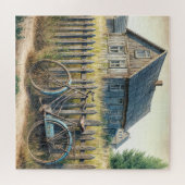 Verlassene alte Fahrrad an rustikaler Zaun Puzzle (Horizontal)