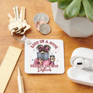 Verloren in einem Buch... Schlüsselanhänger