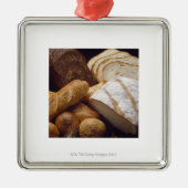 Verschiedene Arten des Handwerkerbrotes Silbernes Ornament (Vorne)