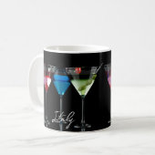Verschiedene Cocktails in Martini-Brillen auf schw Kaffeetasse (Vorderseite Links)