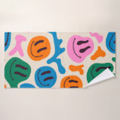 Verschiedene farbenfrohe, schmelzende Gesichter. L Badehandtuch (Badehandtuch)