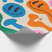 Verschiedene farbenfrohe, schmelzende Gesichter. L Geschenkpapier (Ecke)