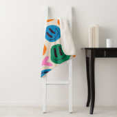 Verschiedene farbenfrohe, schmelzende Gesichter. L Sherpadecke (Beispiel)