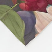 Verschiedene Früchte, üppige Blätter und wundersch Fleecedecke (Ecke)