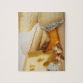Verschiedene Käse auf der Tafel Puzzle (Vertikal)