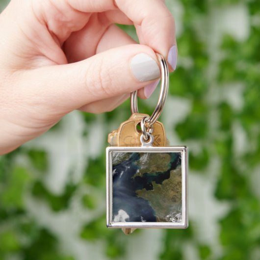 Verschmutzung durch Frankreich Schlüsselanhänger (Hand)