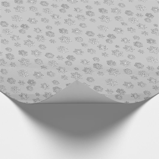 Versilbern Sie 3 d-Schneeflocken auf einem Geschenkpapier (Ecke)