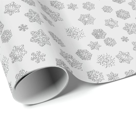 Versilbern Sie 3 d-Schneeflocken auf einem Geschenkpapier (Rolleneckpunkt)