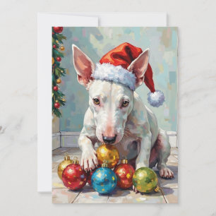 Verspielter Bull Terrier Hund bewacht Weihnachten