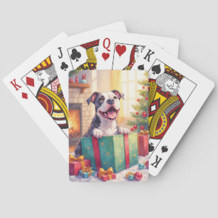 Verspielter Pitbull öffnet Weihnachtsgeschenke Fei Spielkarten