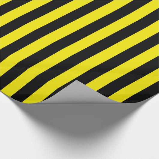 Vertikale schwarze und gelbe Streifen Geschenkpapier (Ecke)